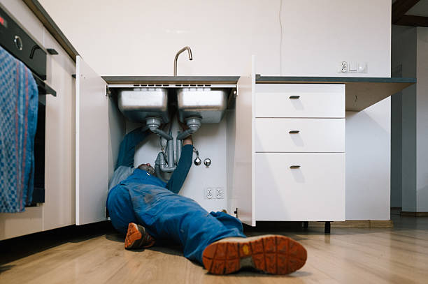 Professional Emergency Plumber technician working in Adams Center, NY